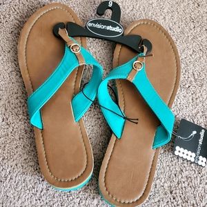 Envision Studios faux leather flip flops turquoise and tan size 9